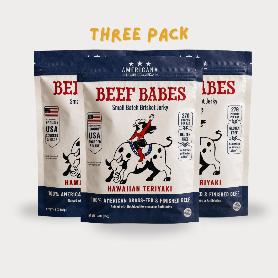 Three stand-up pouches of Americana Beef Babes Small Batch Brisket Jerky in Hawaiian Teriyaki flavor, arranged in a three-pack bundle with a yellow 'THREE PACK' text overlay on a light gray background.