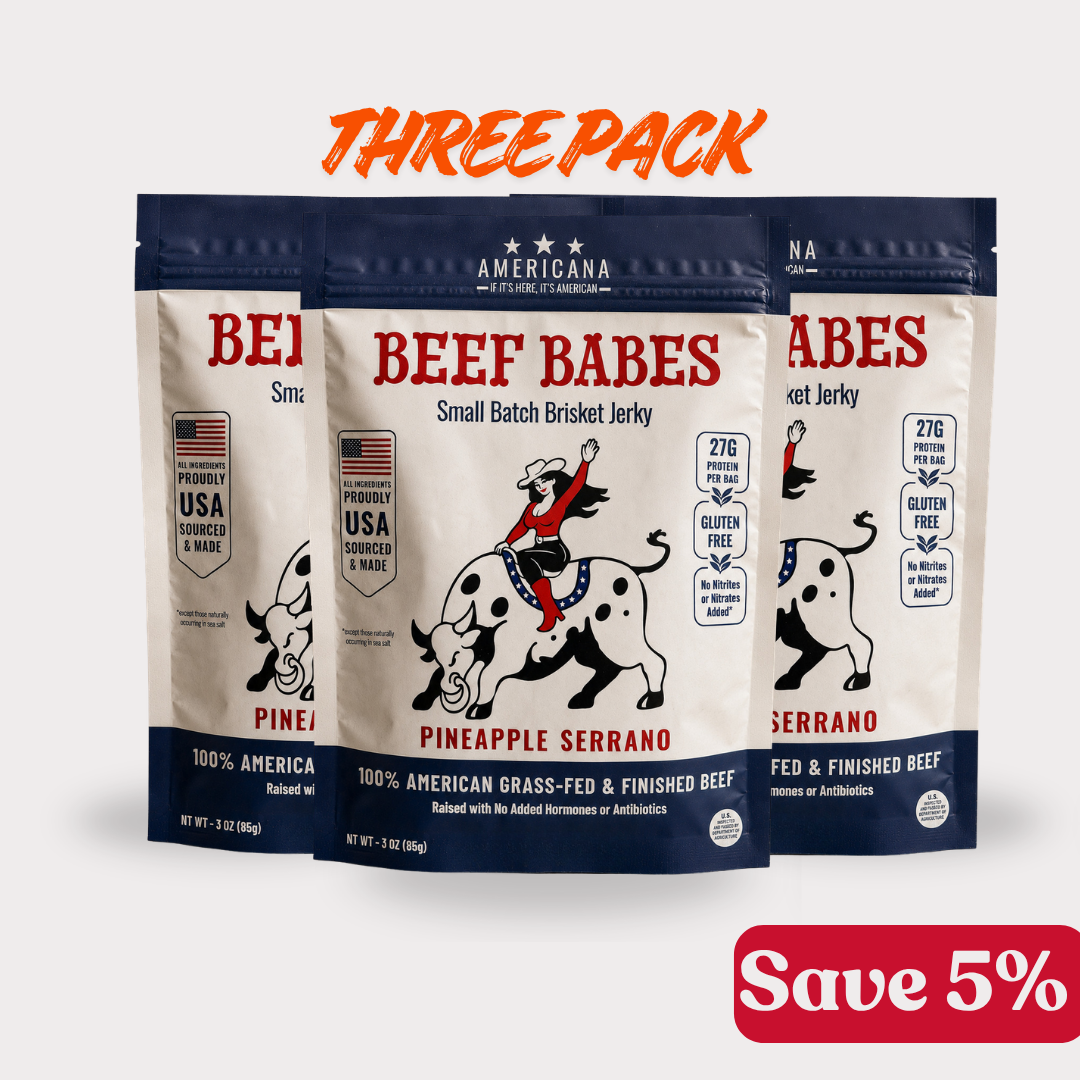 Three stand-up pouches of Americana Beef Babes Pineapple Serrano small batch brisket jerky.