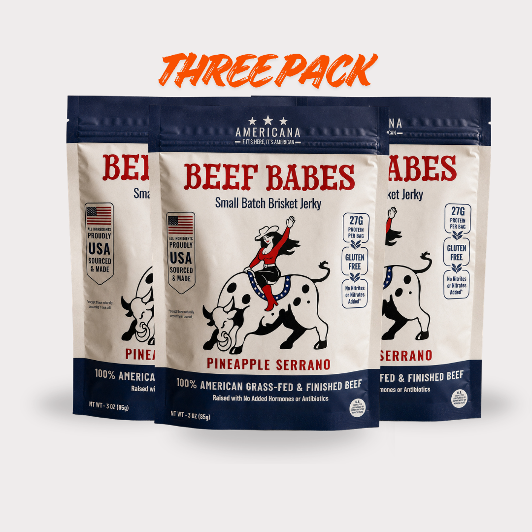 Three stand-up pouches of Americana Beef Babes Pineapple Serrano small batch brisket jerky.