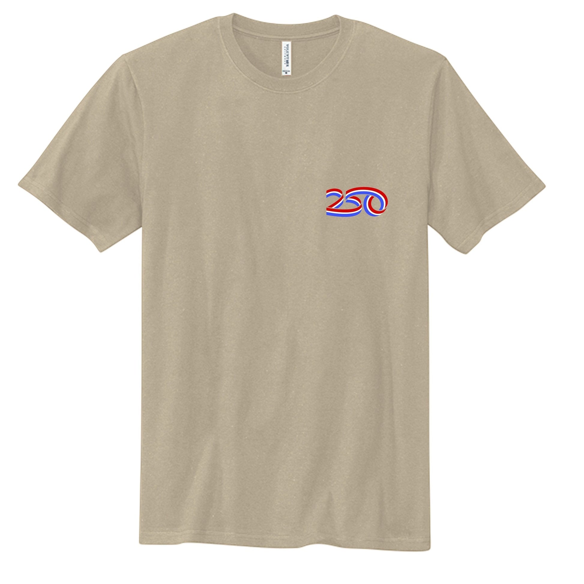 Americana 250 Bleeding Flag graphic t-shirt in tan cotton with a small red, white, and blue logo on the chest.