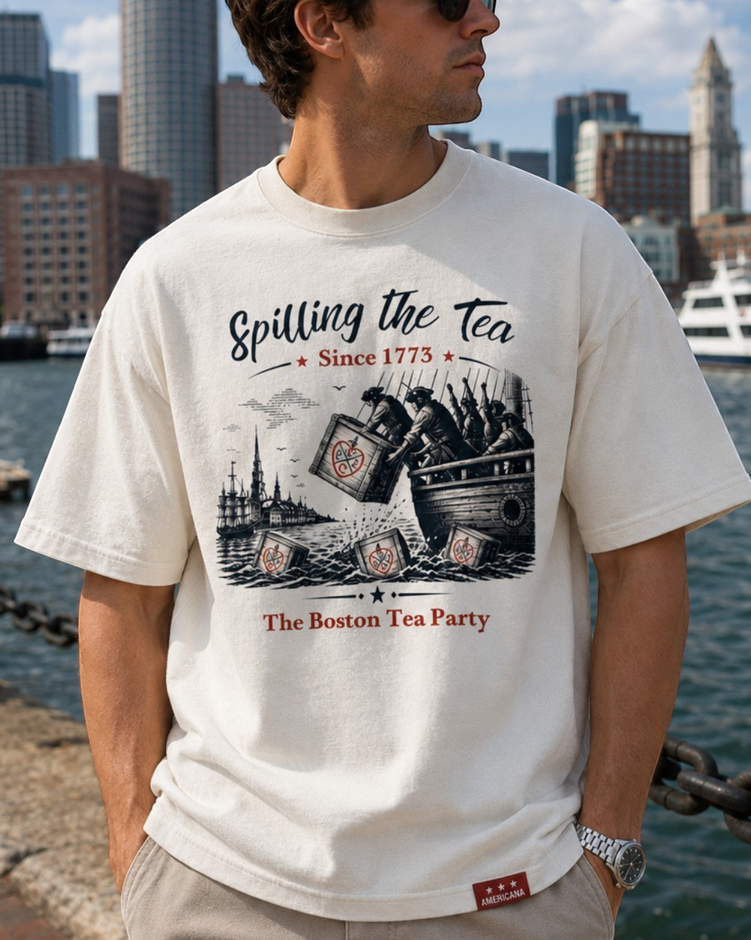 Americana off-white cotton crewneck t-shirt featuring a vintage Boston Tea Party graphic and brand hem tag