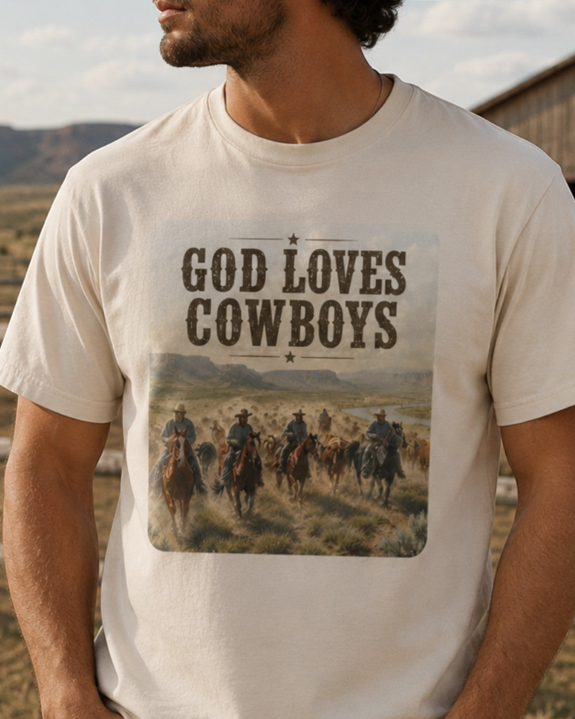 Americana cream crewneck t-shirt featuring a vintage cattle drive graphic and God Loves Cowboys typography