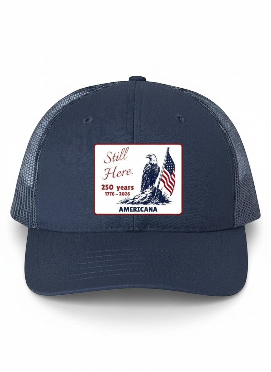 Americana navy blue trucker hat with white mesh back and patriotic eagle and American flag patch