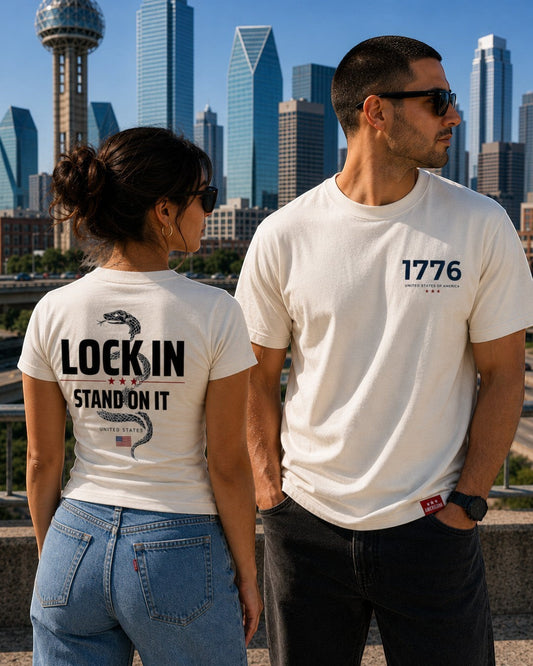 Americana off-white crewneck t-shirt with 1776 chest print and snake graphic back design worn by a man and woman.